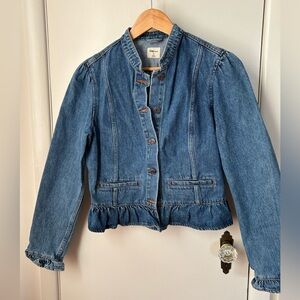 Denim jacket with peplum ruffled cuff
Semi fitted